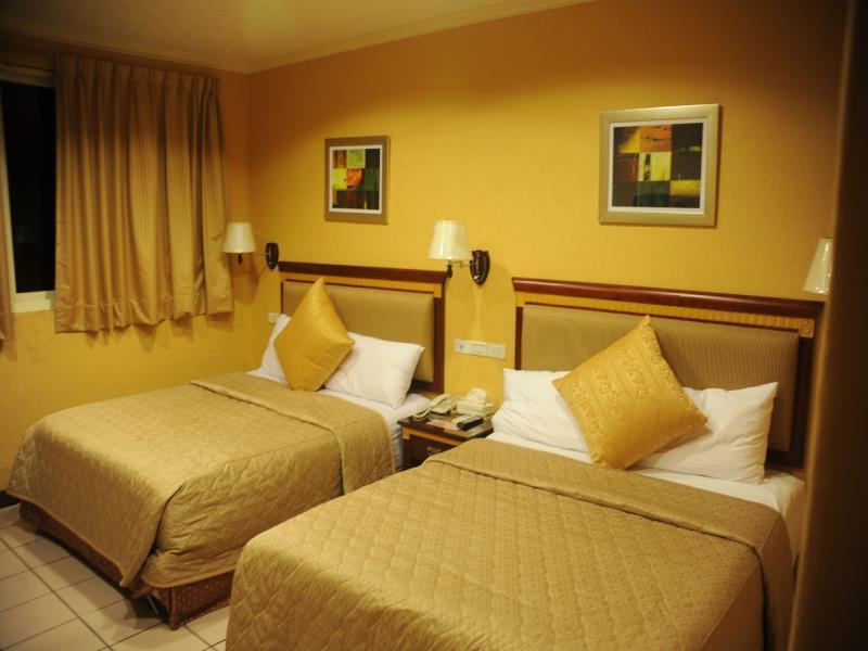 Puti Commercial Hotel Лонгтан Экстерьер фото