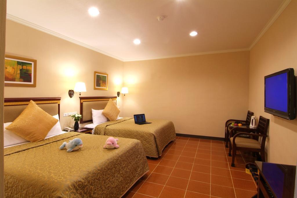 Puti Commercial Hotel Лонгтан Экстерьер фото