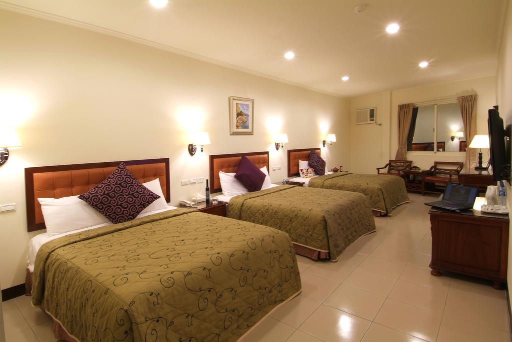 Puti Commercial Hotel Лонгтан Экстерьер фото
