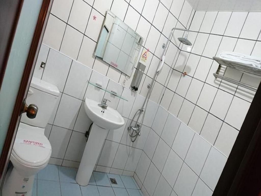 Puti Commercial Hotel Лонгтан Экстерьер фото