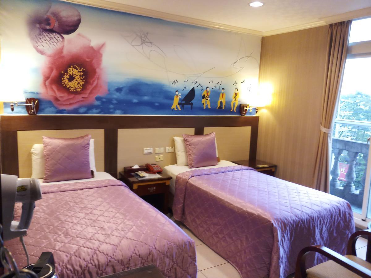 Puti Commercial Hotel Лонгтан Экстерьер фото