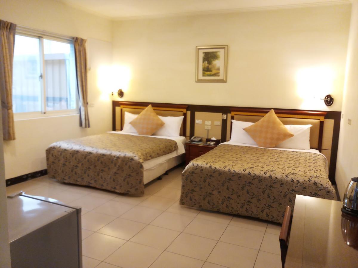Puti Commercial Hotel Лонгтан Экстерьер фото