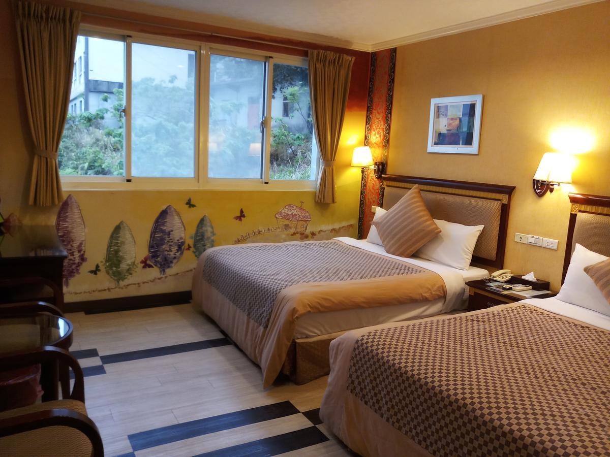 Puti Commercial Hotel Лонгтан Экстерьер фото